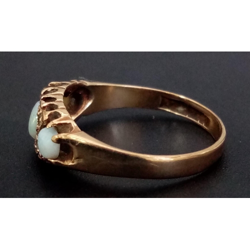 484 - An Edwardian 9K Yellow Gold Three Opal Ring. Size N. 1.89g total weight.