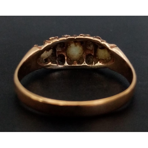 484 - An Edwardian 9K Yellow Gold Three Opal Ring. Size N. 1.89g total weight.