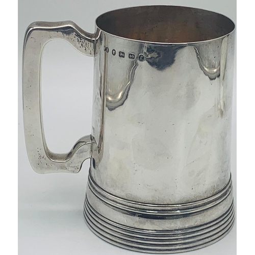 51 - An Antique Victorian Sterling Silver Tankard. Hallmarks for Birmingham 1877. Makers mark of Elkingto... 