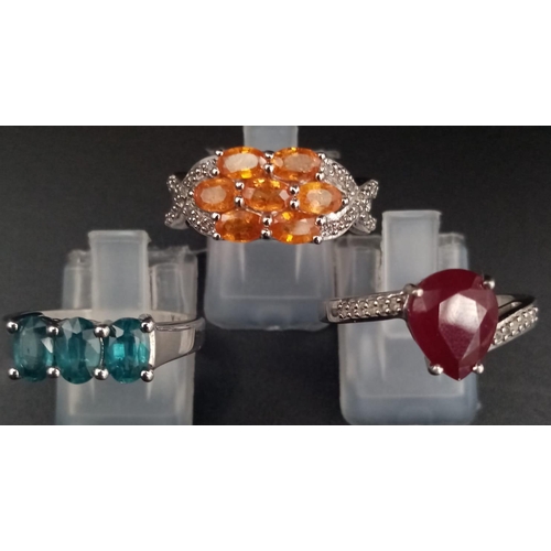 738 - Three 925 Silver Gemstone Rings. Orange, blue and red topaz. 1 x P, 2 x R.