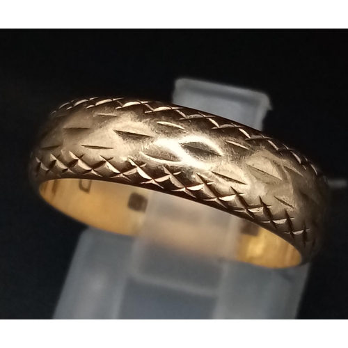 77 - A Vintage 9K Yellow Gold Band ring with Geometric Engraving. Size N. 3.44g total weight.