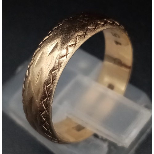 77 - A Vintage 9K Yellow Gold Band ring with Geometric Engraving. Size N. 3.44g total weight.