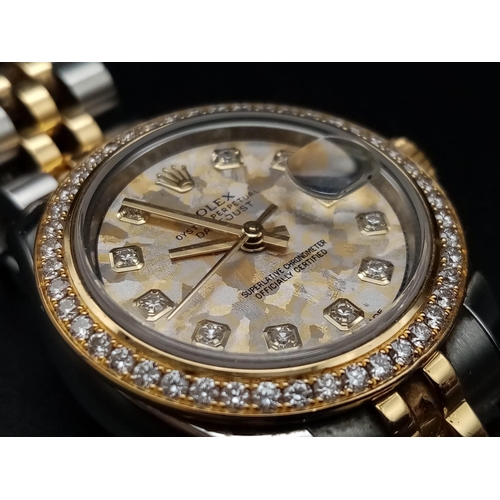 21 - A Bi-Metal Rolex Oyster Perpetual Datejust Diamond Ladies Watch. Gold and stainless steel strap and ... 