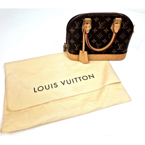 36 - A Louis Vuitton Alma Handbag. Monogram canvas and brown leather. In very good condition but please s... 