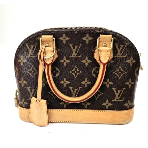 36 - A Louis Vuitton Alma Handbag. Monogram canvas and brown leather. In very good condition but please s... 