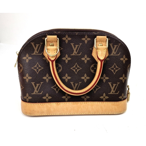 36 - A Louis Vuitton Alma Handbag. Monogram canvas and brown leather. In very good condition but please s... 