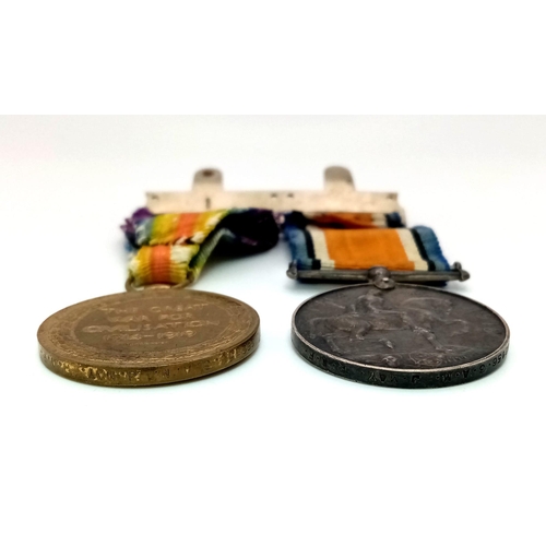 491 - Two WW1 War Medals with Ribbons. The Great War and the British War Medal - belonging to Officer J. M... 