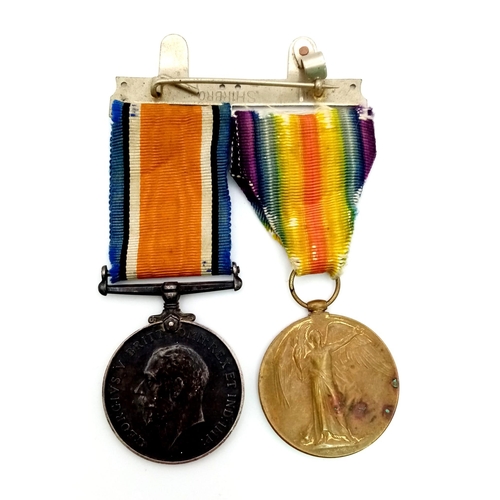 491 - Two WW1 War Medals with Ribbons. The Great War and the British War Medal - belonging to Officer J. M... 