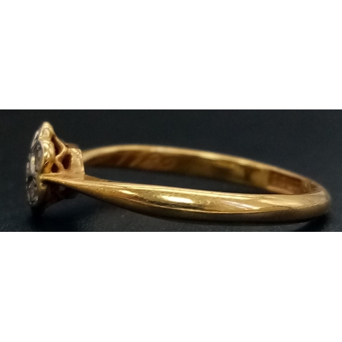 572 - A Vintage 18K Yellow Gold Diamond Floral Ring. Seven small diamonds - one flower. Size K. 1.77g tota... 