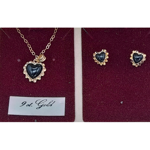 585 - A 9K Yellow Gold Pendant and Onyx Heart  Earring Set. Pendant is on a 9K gold disappearing necklace.... 