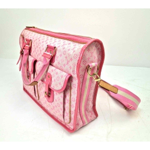 141 - A Louis Vuitton Mary Kate 2-way Bag. Strawberry pink canvas and patent leather with a monogram patte... 