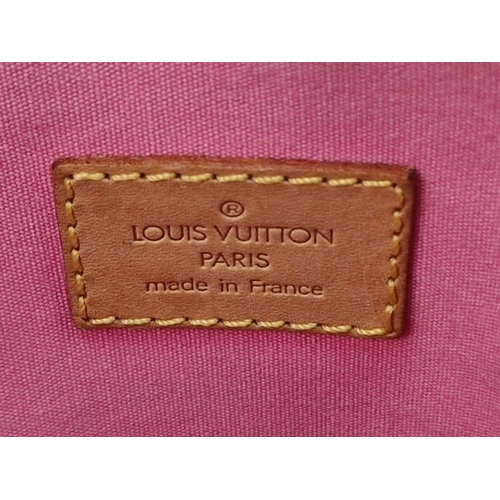 141 - A Louis Vuitton Mary Kate 2-way Bag. Strawberry pink canvas and patent leather with a monogram patte... 