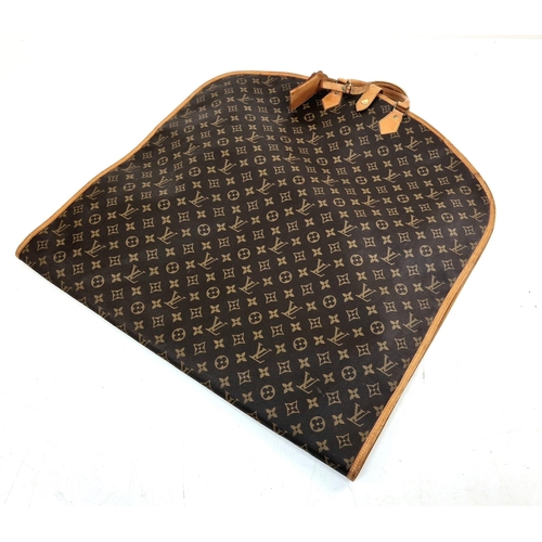 454 - A Louis Vuitton Garment Bag. Monogram brown canvas and leather. Zipped opening with hanging attachme... 