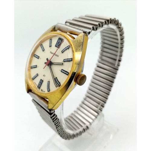 542 - A Vintage Swissam Gents Watch. Expandable strap. Two tone steel case - 35mm. Mechanical movement in ... 