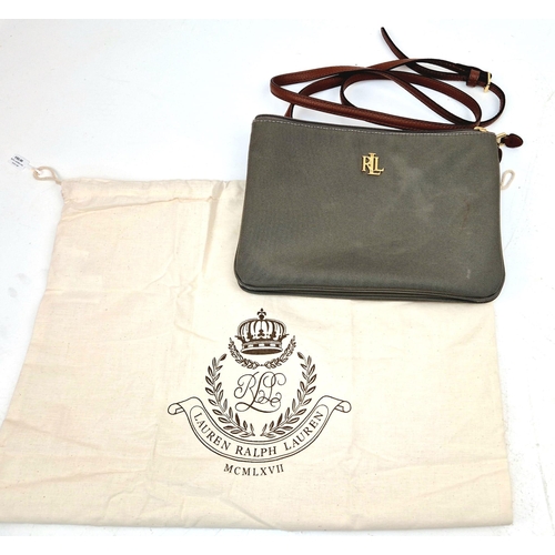 660 - A Ralph Lauren Green Canvas Shoulder Bag. Gilded exterior monogram. Two zipped pockets with monogram... 