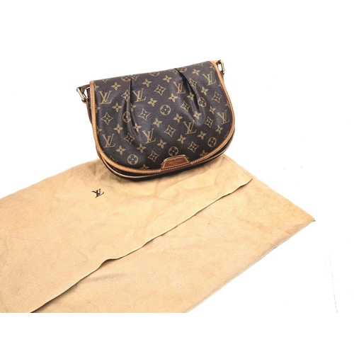 303 - A Louis Vuitton Sling Bag. Monogram canvas and brown leather. Open front flap. Inner zipped compartm... 