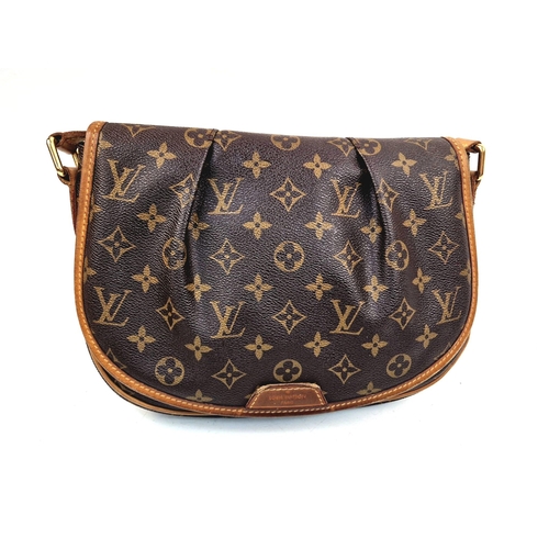 303 - A Louis Vuitton Sling Bag. Monogram canvas and brown leather. Open front flap. Inner zipped compartm... 