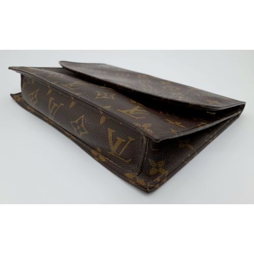 509 - A Louis Vuitton Clutch Flap Bag. Monogram canvas with a zip front pocket. Brown leather interior. 23... 