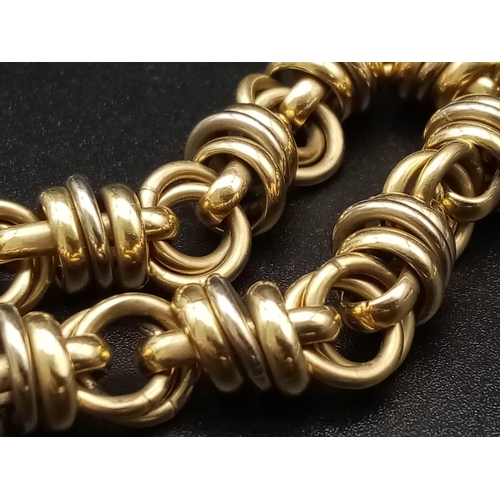 22 - A Vintage 14K Yellow Gold Figaro Link Bracelet. 18cm. 19.51g.