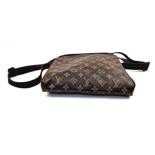 309 - A Louis Vuitton Messenger-Style Shoulder Bag. Monogram brown canvas. Large front flap. Zip top openi... 