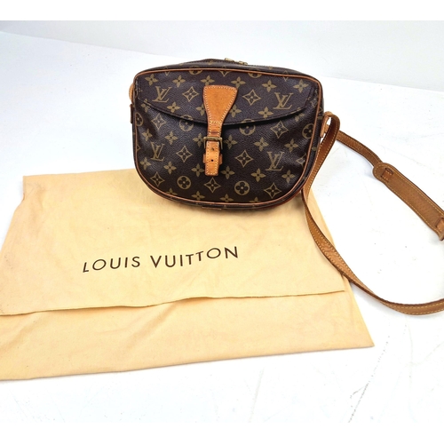 314 - A Louis Vuitton Jeune Fille Crossbody Bag. Monogram canvas and brown leather. Large buckle-open fron... 