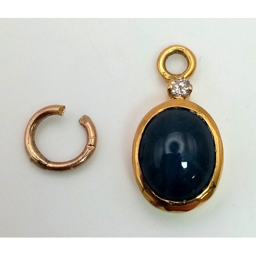 300 - A 9K Gold Sapphire and Diamond Pendant. Oval sapphire with a 0.03ct diamond. 15mm. 1.72g total weigh... 