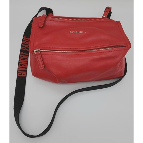 374 - A Givenchy Pandora Red Leather Crossbody Bag. Two zipped compartments. 25 x 15cm. In good condition ... 