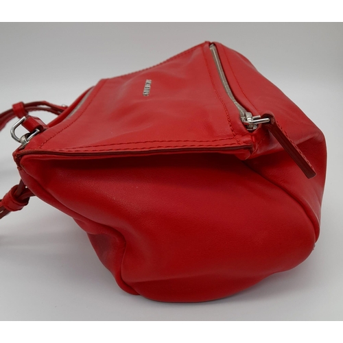 374 - A Givenchy Pandora Red Leather Crossbody Bag. Two zipped compartments. 25 x 15cm. In good condition ... 