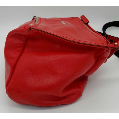 374 - A Givenchy Pandora Red Leather Crossbody Bag. Two zipped compartments. 25 x 15cm. In good condition ... 