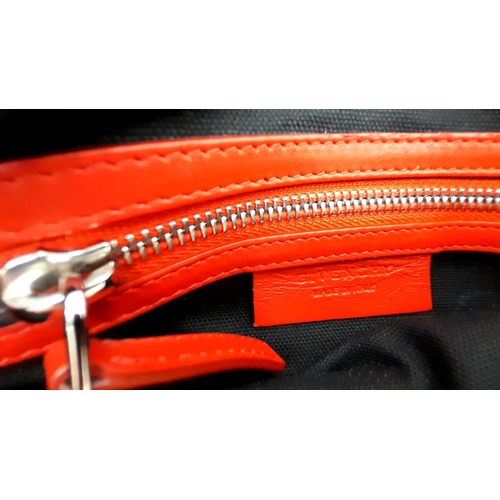 374 - A Givenchy Pandora Red Leather Crossbody Bag. Two zipped compartments. 25 x 15cm. In good condition ... 