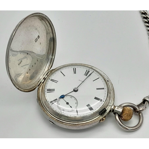 80 - A full hunter H/M silver pocket watch with movement by Thomas McNeil Greenock dated 1894 Chester wit... 