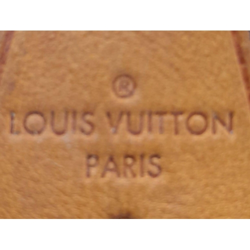 161 - A Louis Vuitton Lockit Handbag. Monogram canvas and brown leather exterior. Lock with key. 25 x 28cm... 