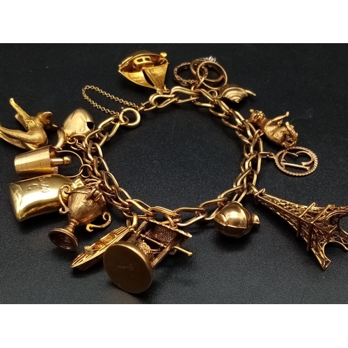 162 - A Vintage 9K Gold Charm Bracelet with 17 Diverse 9K Gold Charms! 16cm. 52.1g total weight.