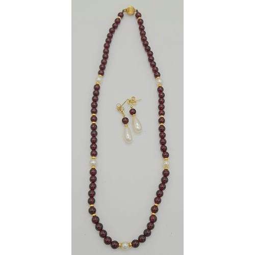 328 - A Beautiful Red Garnet, Pearl Necklace and Earring Set. 18k gold necklace clasp and earring backing.... 