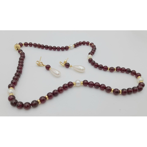 328 - A Beautiful Red Garnet, Pearl Necklace and Earring Set. 18k gold necklace clasp and earring backing.... 