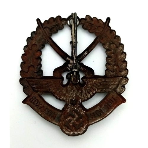 460 - WW2 German/Young Russian Cossacks Badge. The badge depicting x2 crossed Cossacks Sabres mounted in a... 