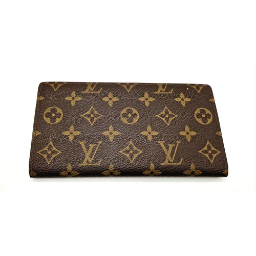 503 - A Louis Vuitton Large Wallet. Monogram canvas. Brown leather inner. 20 x 10cm. Comes with a dust cov... 