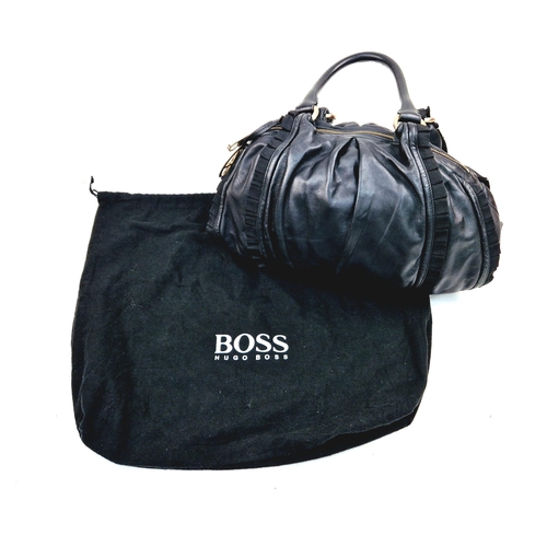 741 - A Hugo Boss Black Ruffled Leather Handbag. Monogram gilded hardware. Monogram inner with plenty of z... 