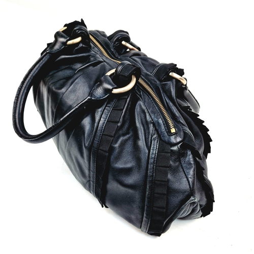 741 - A Hugo Boss Black Ruffled Leather Handbag. Monogram gilded hardware. Monogram inner with plenty of z... 