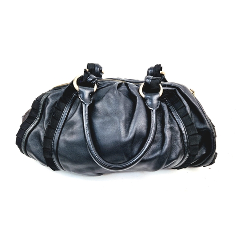 741 - A Hugo Boss Black Ruffled Leather Handbag. Monogram gilded hardware. Monogram inner with plenty of z... 