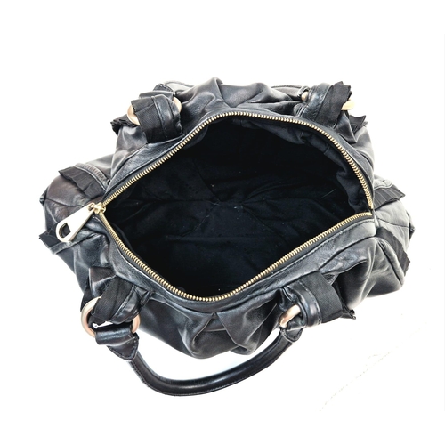 741 - A Hugo Boss Black Ruffled Leather Handbag. Monogram gilded hardware. Monogram inner with plenty of z... 