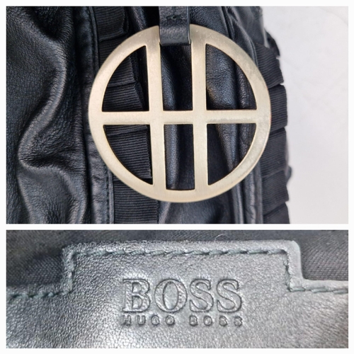 741 - A Hugo Boss Black Ruffled Leather Handbag. Monogram gilded hardware. Monogram inner with plenty of z... 