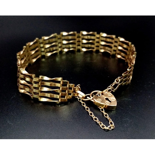 95 - A Vintage 9K Yellow Gold Gate Bracelet with Heart Clasp. 18cm. 5.25g.