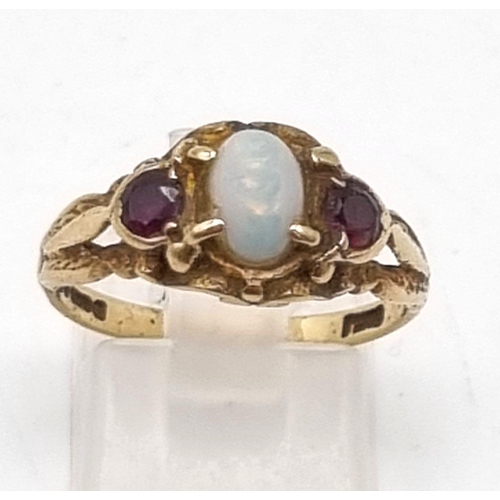 1191 - 9k Yellow Gold Vintage Ruby and Opal Ring.
Size P, Weighs 3G