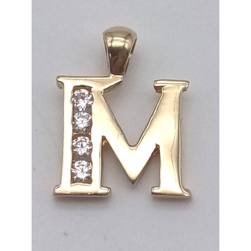 1199 - 14K YELLOW GOLD STONE SET INITIAL M CHARM/ PENDANT 1.6G.