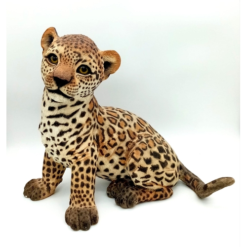 984 - A large wonderfully detailed Leopard Sculpture. Approx 40cm x 30cm. Weighs 3kg