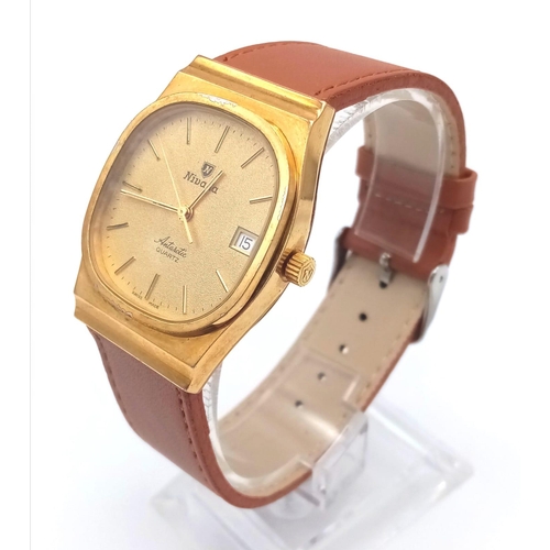 310 - A Vintage Nivada Gold Plated Antarctic Gents watch. Brown leather strap. Two tone case - 32mm. Gold ... 