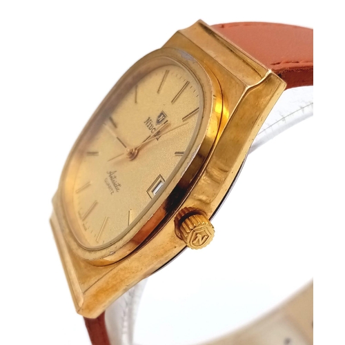 310 - A Vintage Nivada Gold Plated Antarctic Gents watch. Brown leather strap. Two tone case - 32mm. Gold ... 