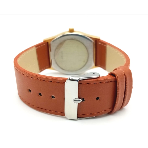 310 - A Vintage Nivada Gold Plated Antarctic Gents watch. Brown leather strap. Two tone case - 32mm. Gold ... 