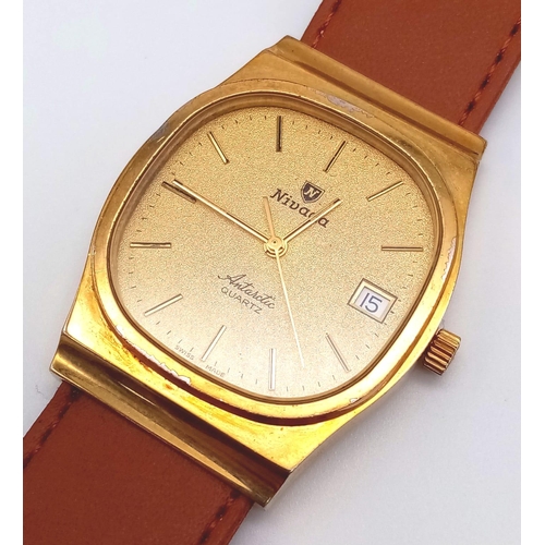 310 - A Vintage Nivada Gold Plated Antarctic Gents watch. Brown leather strap. Two tone case - 32mm. Gold ... 